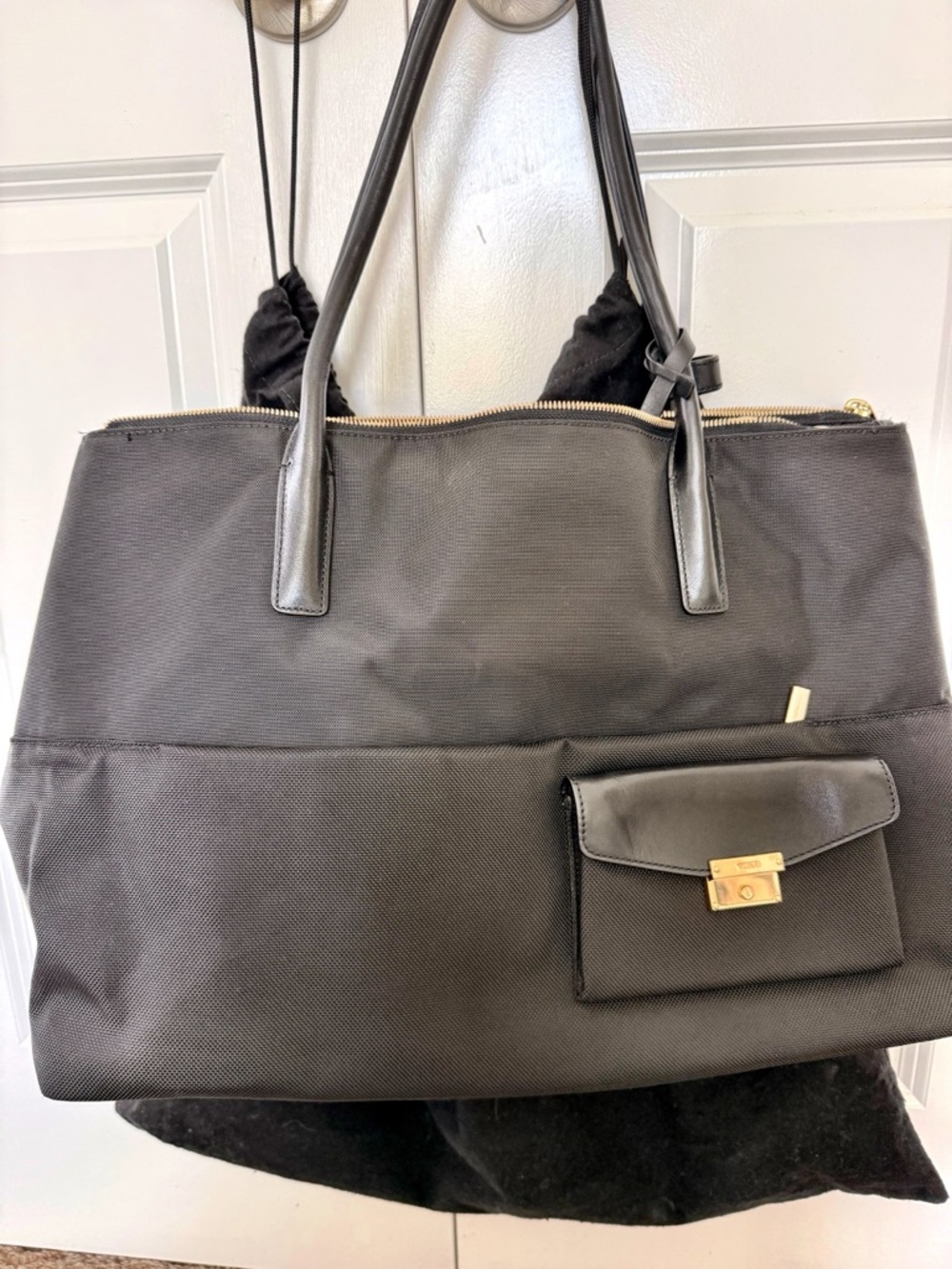 Tumi Black Travel Larkin Hayes Triple Compartment Tote
Ballistic nylon
